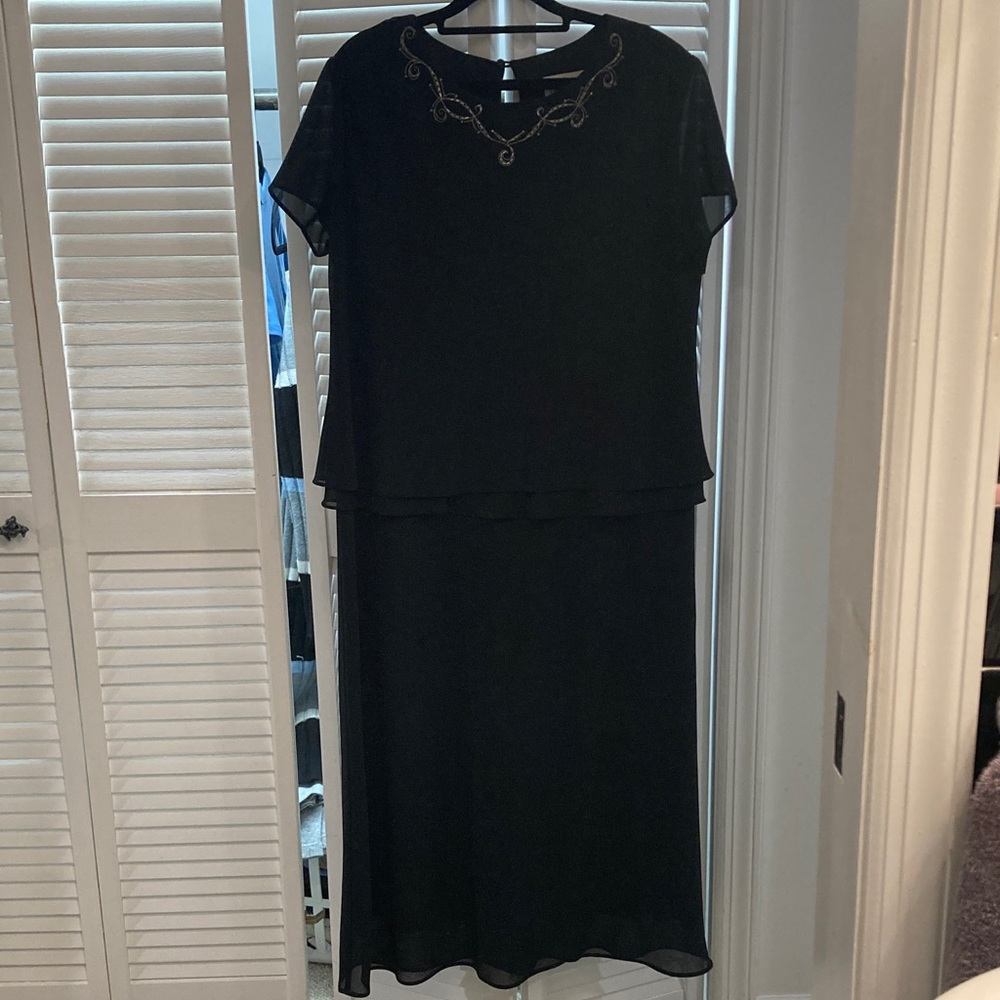 Chic Black Maxi Dress with Embellished Neckline